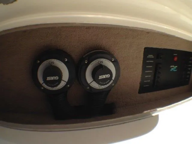 Slide: The Image of Electrical switches in Sea Ray Sundancer 310, 1998 model. - 31