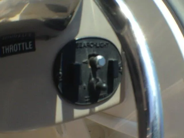 Slide: The Image of Close-up of throttle control on a 1998 Sea Ray Sundancer 310. - 34