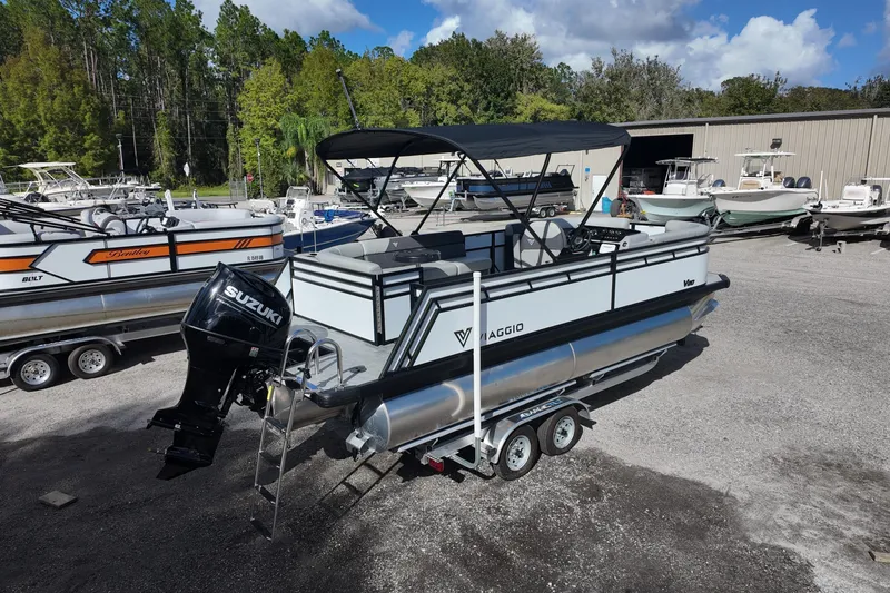 Slide: The Image of 2026 Viaggio Lago V 20 C pontoon boat with Suzuki engine on trailer. - 2