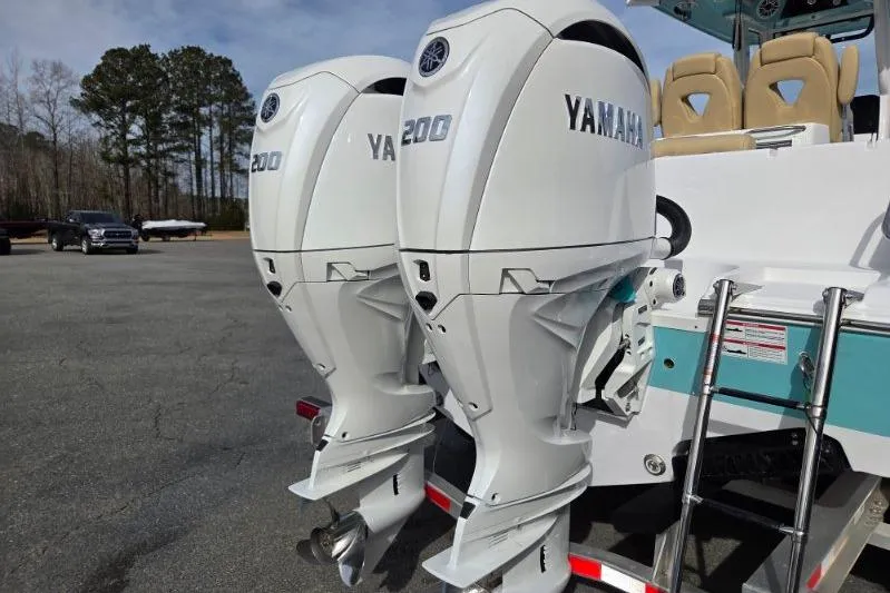 Slide: The Image of 2026 Sportsman Open 262 Center Console with dual Yamaha 200 outboard engines. - 5