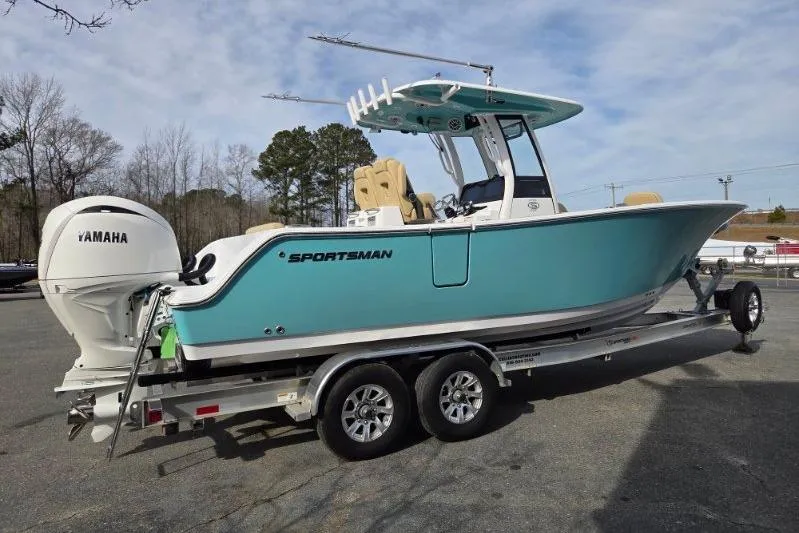 Slide: The Image of 2026 Sportsman Open 262 Center Console boat on trailer, featuring Yamaha engine. - 6