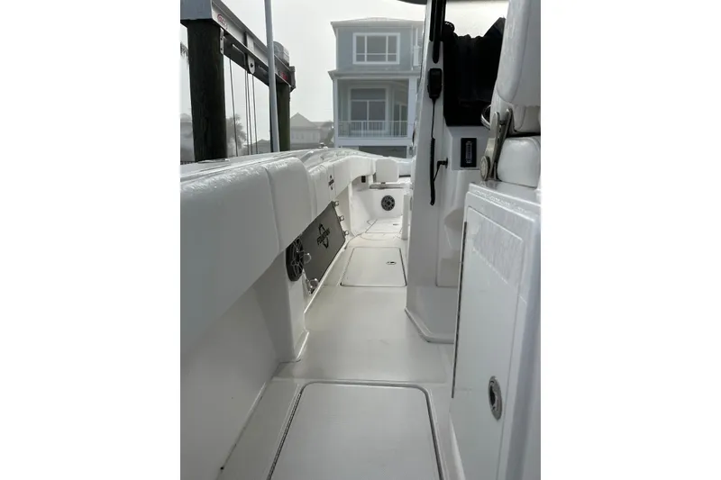 Slide: The Image of 2024 Fountain 38 Center Console boat interior with sleek white design and modern features. - 10