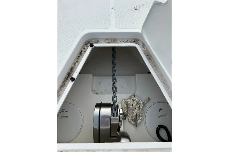 Slide: The Image of Anchor locker of 2024 Fountain 38 Center Console boat with chain and rope. - 7