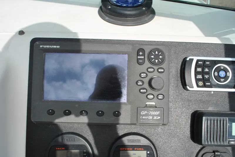 Slide: The Image of Control panel of a 1996 Pursuit 2150 Walkaround boat with Furuno GP-7000F display. - 10