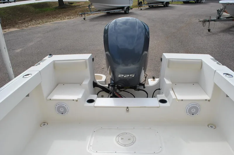 Slide: The Image of 1996 Pursuit 2150 Walkaround boat with 225 horsepower engine, rear deck view. - 15