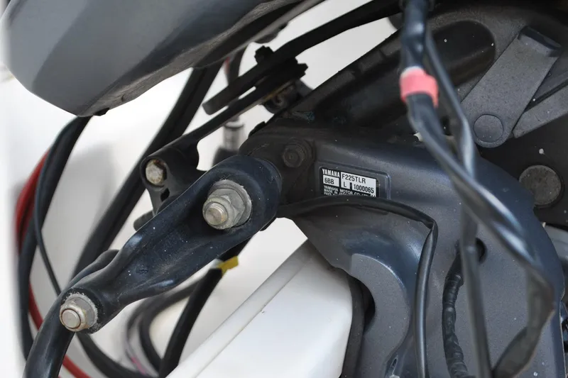 Slide: The Image of Close-up of Yamaha F225TLR engine part on 1996 Pursuit 2150 Walkaround boat. - 20