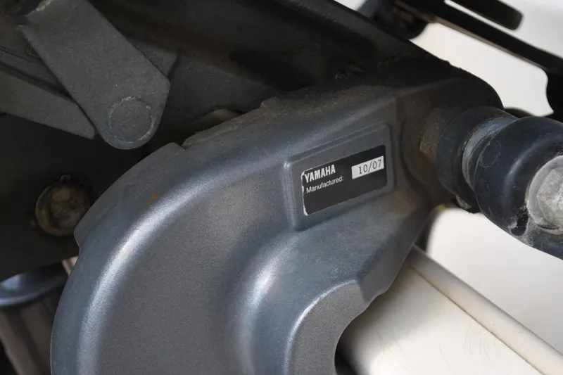 Slide: The Image of Close-up of Yamaha engine part on 1996 Pursuit 2150 Walkaround boat. - 21