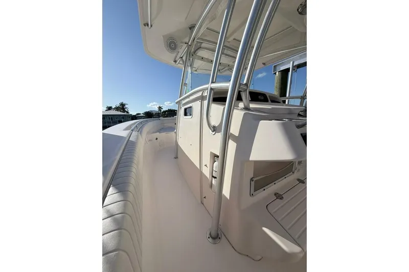 Slide: The Image of 2011 Grady-White Canyon 336 boat deck with sleek design and sturdy railings. - 18