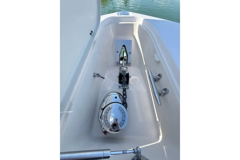 Slide: The Image of Anchor compartment of 2011 Grady-White Canyon 336 boat with Lewmar windlass. - 25