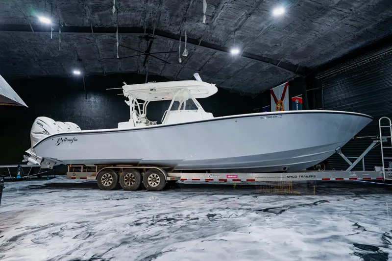 The Image of 2012 Yellowfin 39 Offshore boat on trailer in indoor storage facility. - 0