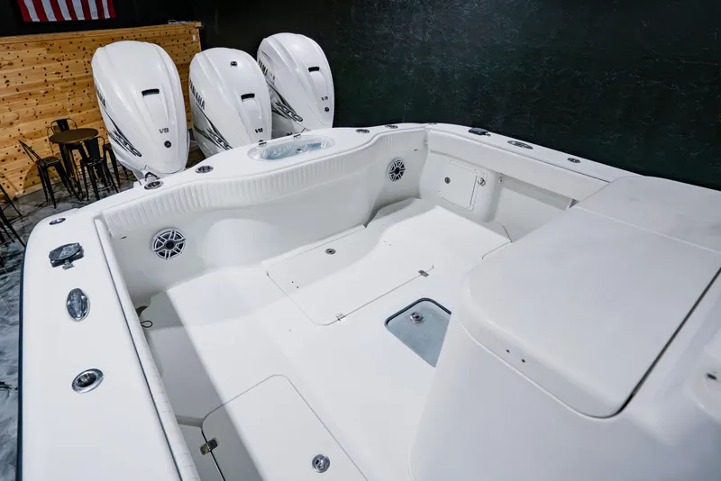 Slide: The Image of 2012 Yellowfin 39 Offshore boat interior with triple Yamaha V8 engines. - 29