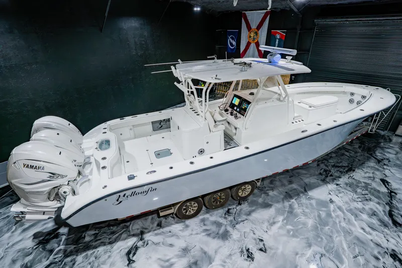 Slide: The Image of 2012 Yellowfin 39 Offshore boat with Yamaha engines in a showroom setting. - 3