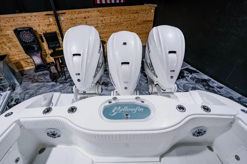 Slide: The Image of 2012 Yellowfin 39 Offshore boat with triple V8 engines, indoor setting. - 33
