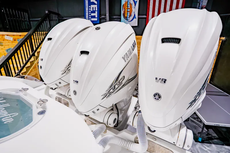 Slide: The Image of Triple Yamaha V8 outboard engines on a 2012 Yellowfin 39 Offshore boat. - 34