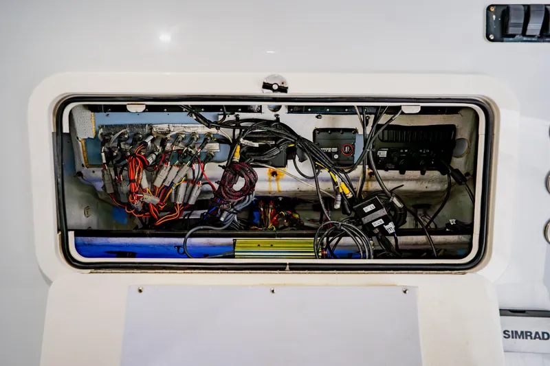 Slide: The Image of Electrical wiring compartment of a 2012 Yellowfin 39 Offshore boat. - 42