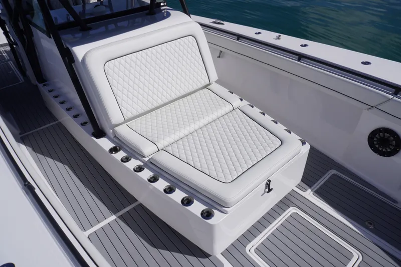 Slide: The Image of Luxurious seating on 2019 SeaHunter 45 Tournament boat with quilted white upholstery. - 13