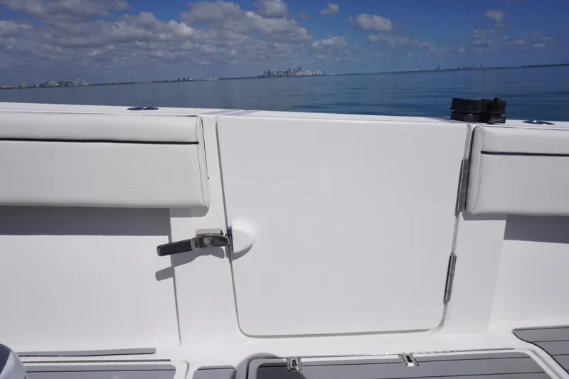 Slide: The Image of 2019 SeaHunter 45 Tournament boat deck with ocean and city skyline view. - 18