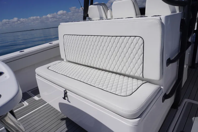 Slide: The Image of 2019 SeaHunter 45 Tournament boat with luxurious white quilted seating. - 20