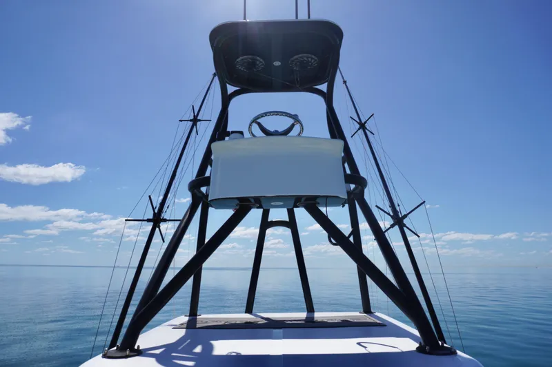 Slide: The Image of 2019 SeaHunter 45 Tournament boat tower against clear blue sky and calm sea. - 36