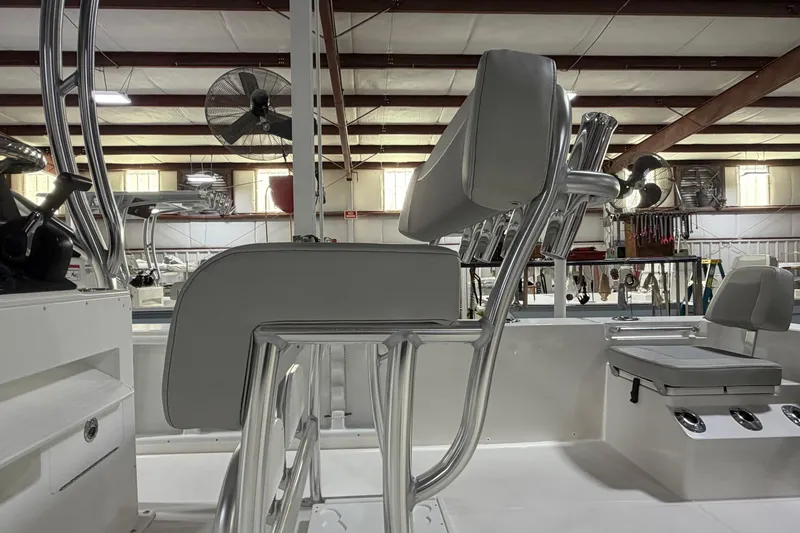 Slide: The Image of 2026 Bay Rider 2460 FS Skiff on trailer, showcasing sleek hull design. - 10