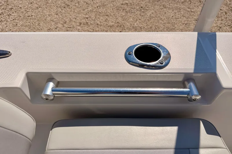 Slide: The Image of Bay Rider 2460 FS Skiff 2026 boat interior with rod holder and grab rail. - 48