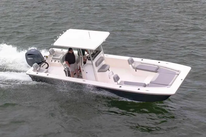 Slide: The Image of Manufacturer Provided Image: 2025 Bay Rider 2460 FS Skiff cruising on water with Yamaha engine. - 52