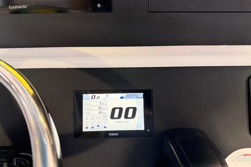 Slide: The Image of Dashboard of 2026 Bay Rider 2460 FS Skiff with Yamaha display and Garmin device. - 55