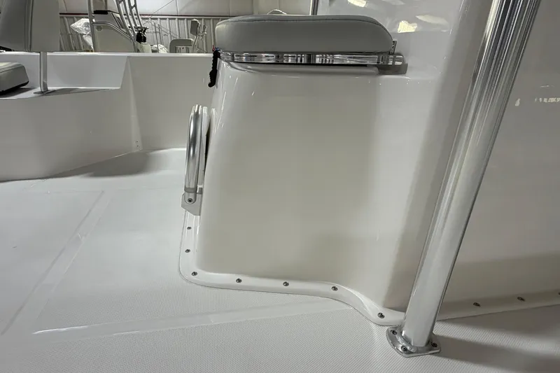 Slide: The Image of 2026 Bay Rider 2460 FS Skiff on trailer, showcasing sleek hull design. - 8