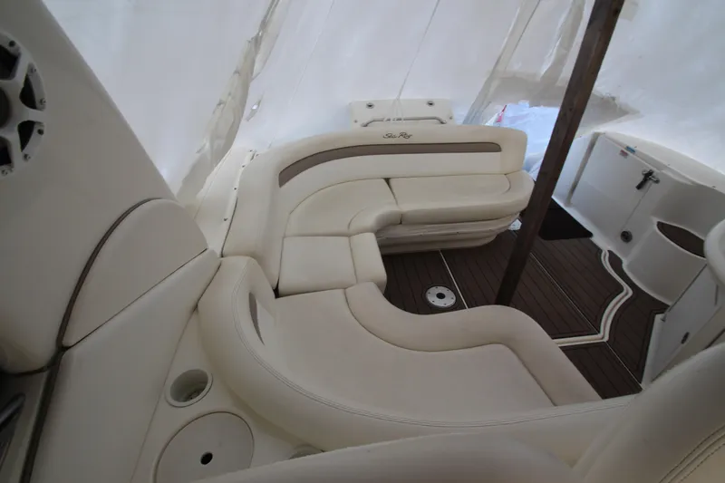 Slide: The Image of 2005 Sea Ray 340 Sundancer interior with cream leather seating and wood flooring. - 37