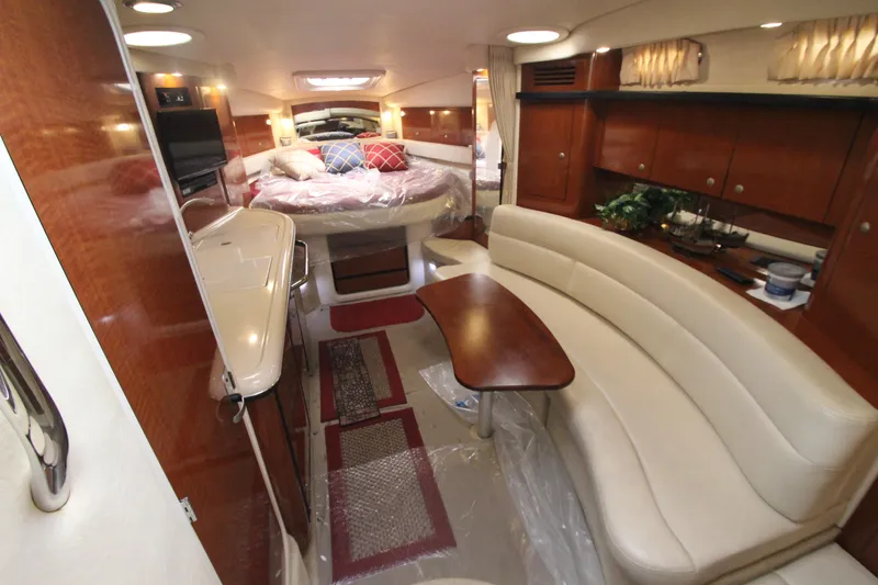 Slide: The Image of Luxurious interior of a 2005 Sea Ray 340 Sundancer yacht with elegant seating and wood finishes. - 7
