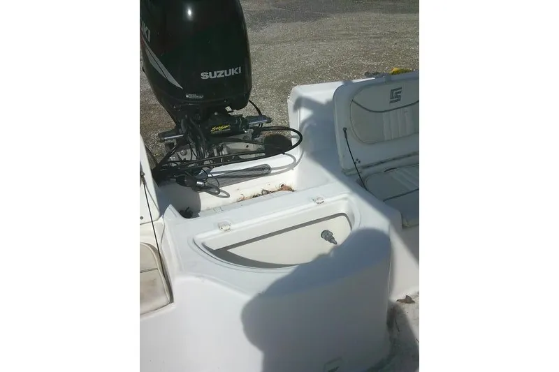 Slide: The Image of 2008 Carolina Skiff 218 DLV Elite boat with Suzuki outboard motor. - 25