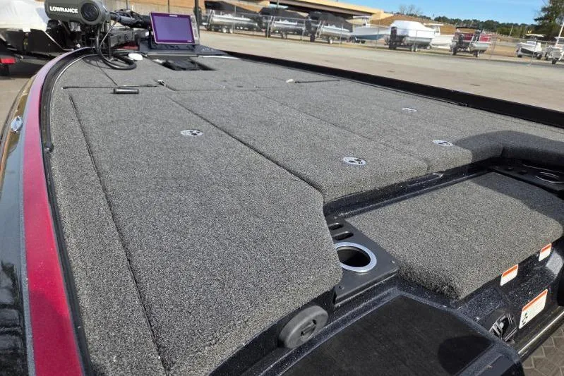 Slide: The Image of 2022 Nitro Z21 XL boat deck with carpeted surface and electronic equipment. - 10