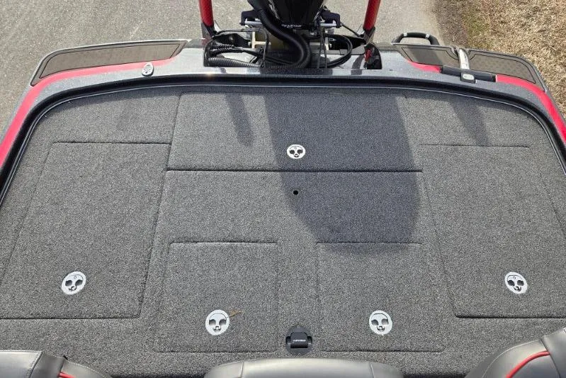 Slide: The Image of 2022 Nitro Z21 XL boat deck with storage compartments and carpeted surface. - 16