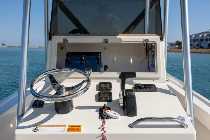 Slide: The Image of Control panel of 2007 Parker 2300 Special Edition boat with Garmin navigation system. - 14