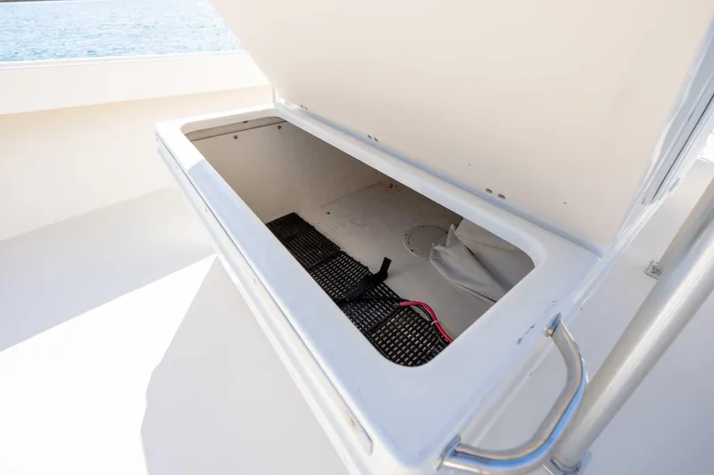 Slide: The Image of Open storage compartment on 2007 Parker 2300 Special Edition boat, showing interior details. - 18