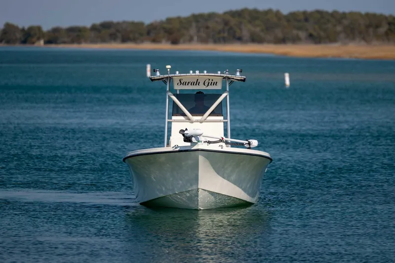 Slide: The Image of 2007 Parker 2300 Special Edition boat on calm water, front view. - 7