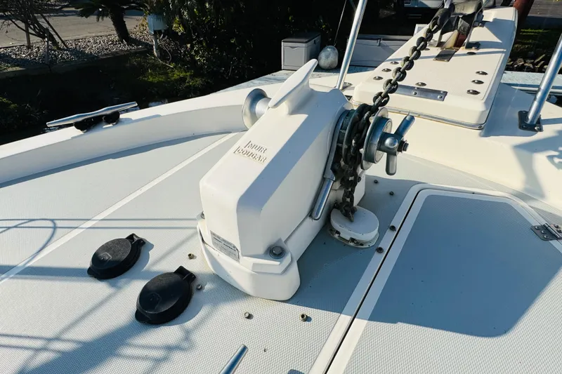 Slide: The Image of 1990 Bayliner 3888 Motoryacht anchor windlass on deck, featuring Muir Cougar system. - 10
