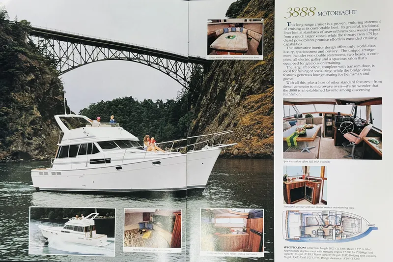 Slide: The Image of 1990 Bayliner 3888 Motoryacht cruising under a bridge, showcasing luxury and spacious interiors. - 39