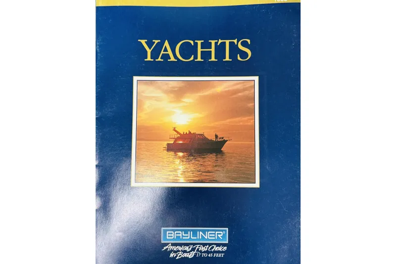 Slide: The Image of 1990 Bayliner 3888 Motoryacht brochure cover with sunset yacht image. - 40