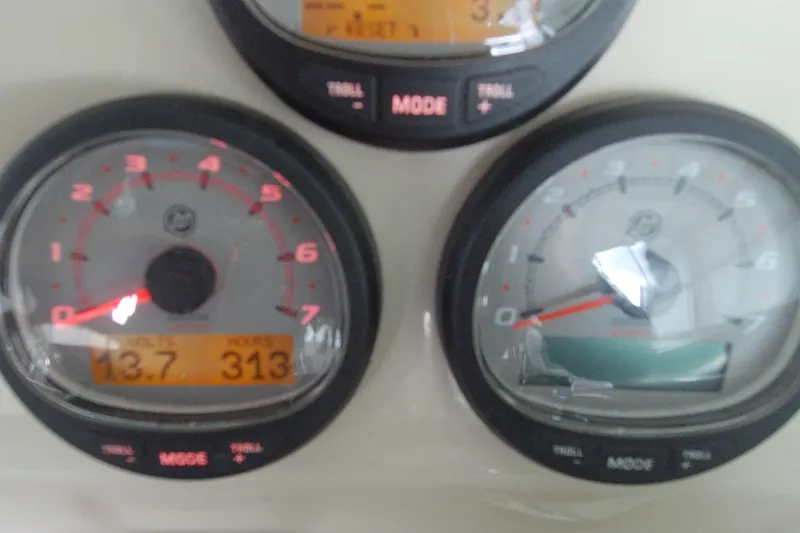 Slide: The Image of Dashboard gauges of a 2021 Boston Whaler 280 Vantage boat. - 18