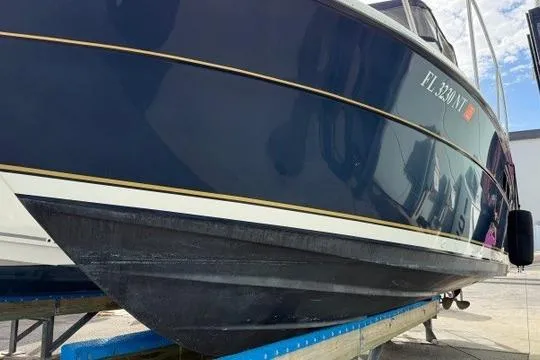 Slide: The Image of 2003 Tiara Yachts 2900 Coronet helm with dual controls and navigation instruments. - 21