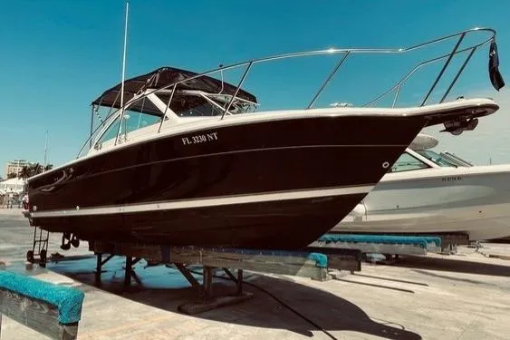 Slide: The Image of Control panel of a 2003 Tiara Yachts 2900 Coronet with navigation screens and gauges. - 22