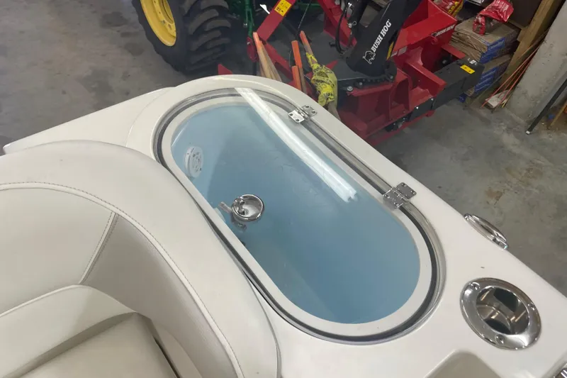 Slide: The Image of 2023 Key West 263 FS boat interior with livewell and cup holder. - 23