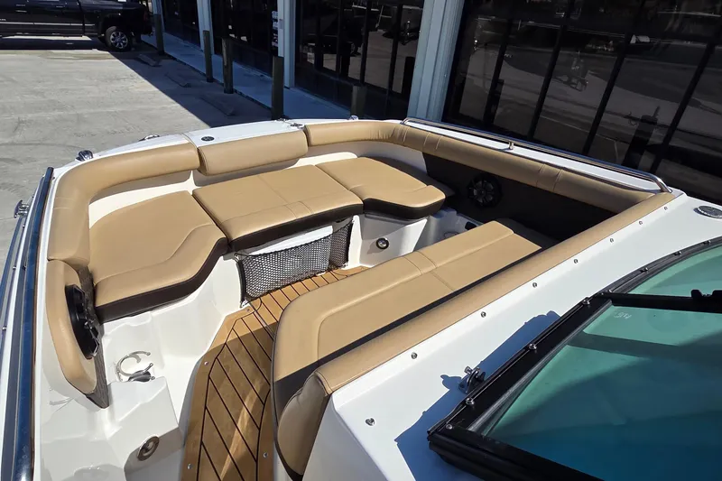Slide: The Image of 2020 Sea Ray SDX 250 Outboard boat with tan seating and spacious deck. - 38