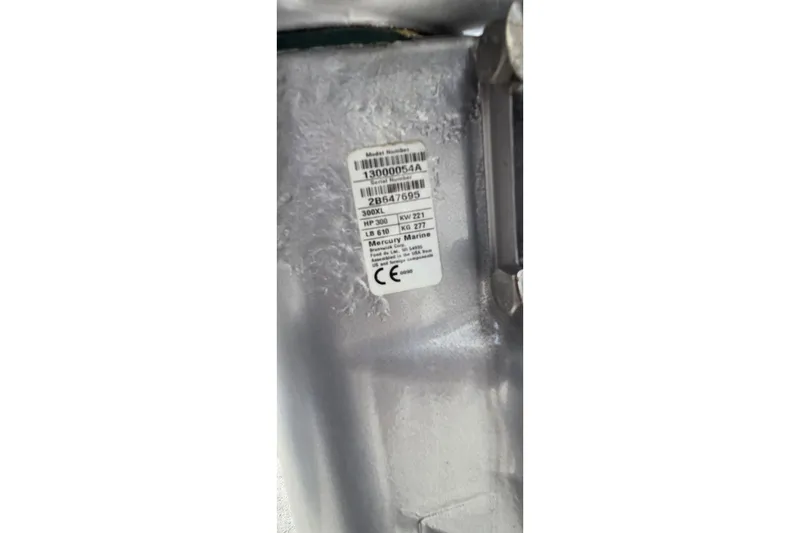 Slide: The Image of 2020 Sea Ray SDX 250 Outboard engine label with specifications and serial number. - 42