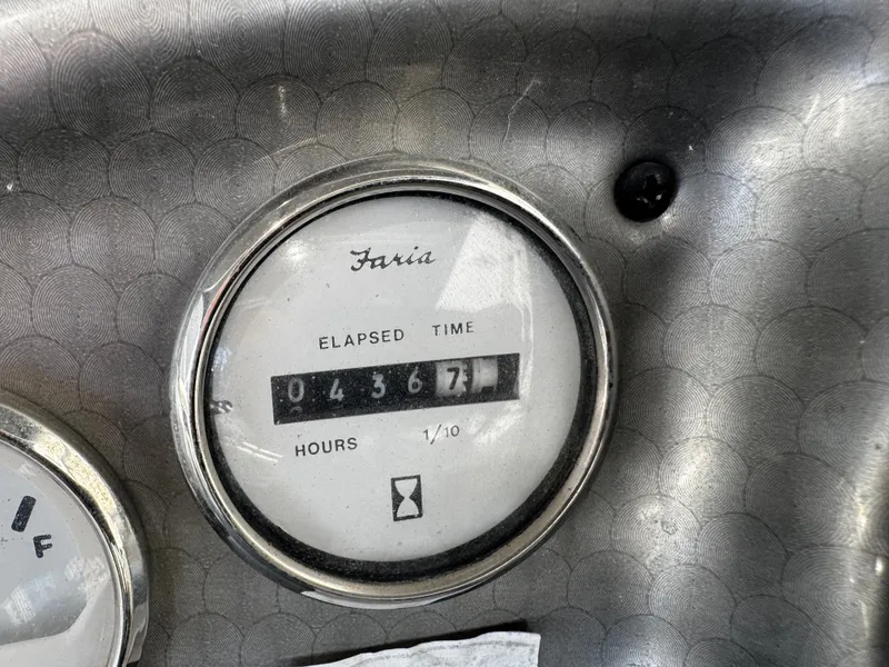 Slide: The Image of Faria hour meter on 2006 Harris Classic 240 I/O showing 4367 hours. - 12