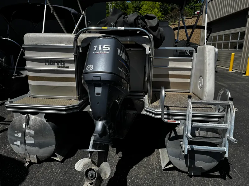 Slide: The Image of 2006 Harris Classic 240 I/O boat with Yamaha 115 outboard motor. - 4