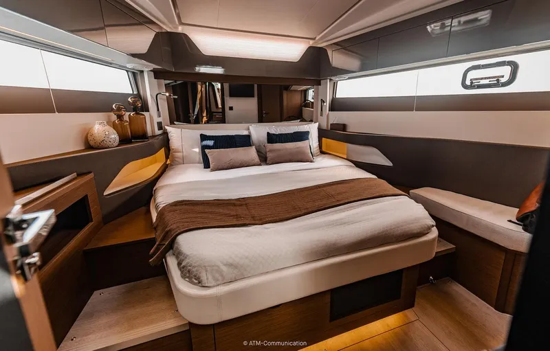 Slide: The Image of Luxurious bedroom interior of 2026 Wellcraft 44 Explorer yacht with modern design and cozy bedding. - 8
