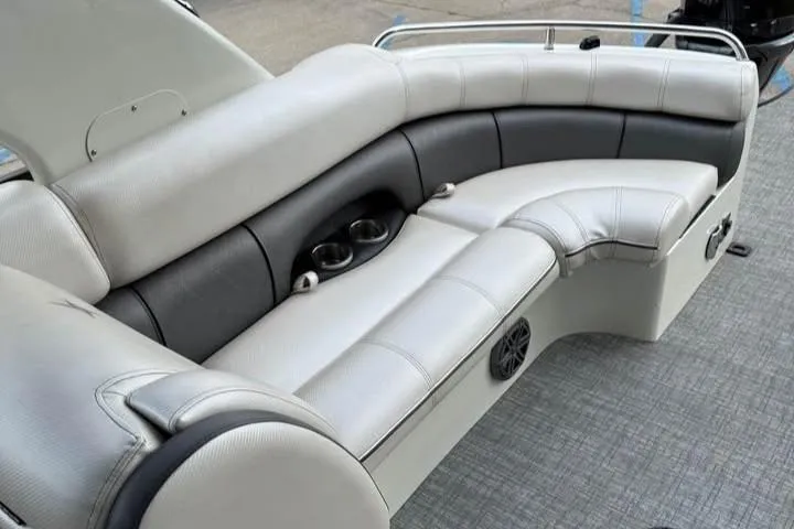 Slide: The Image of Luxurious seating on 2019 Berkshire 29 Sport RFX-DC boat with cup holders and speaker. - 15