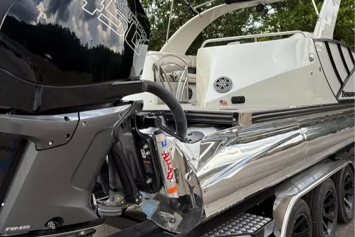 Slide: The Image of 2019 Berkshire 29 Sport RFX-DC pontoon boat with powerful outboard motor. - 16